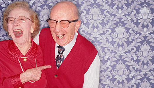 Old couple laughing