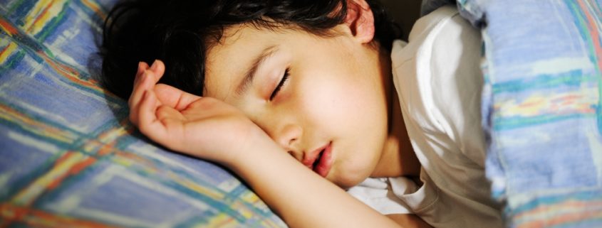 Little boy sleeping. Ortho-Tain is a safe treatment for Sleep Apnea in children